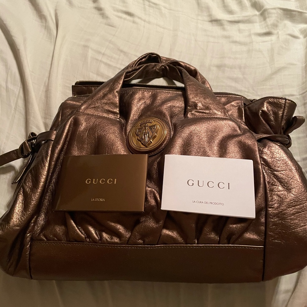 Gold small purse never worn still has tissue